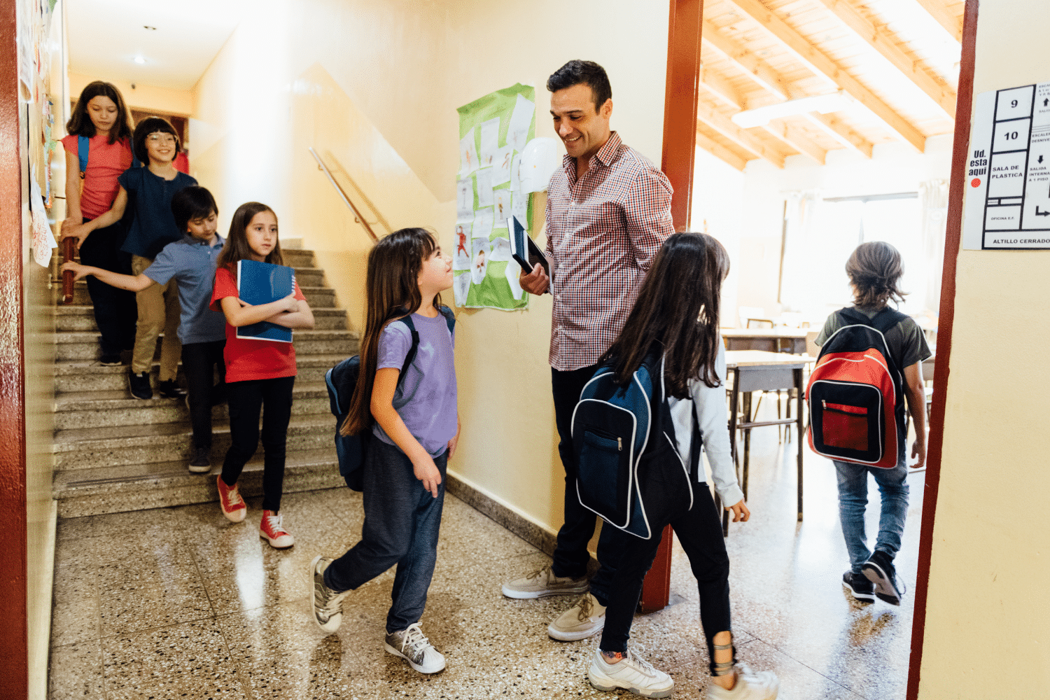 teacher greeting students